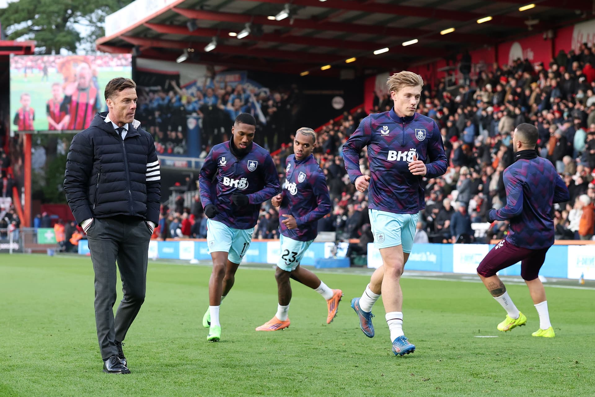 Burnley manager Scott Parker looks on during the players warm up ahead of the Premier League