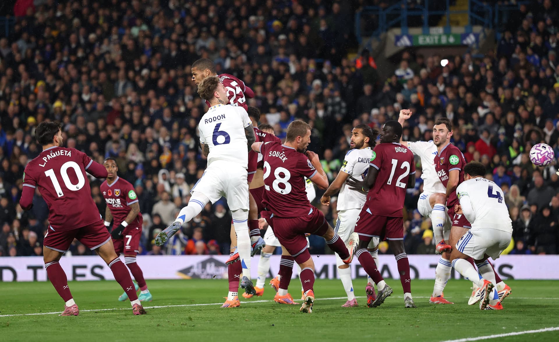 Joe Rodon of Leeds United rises to head in his team's second goal