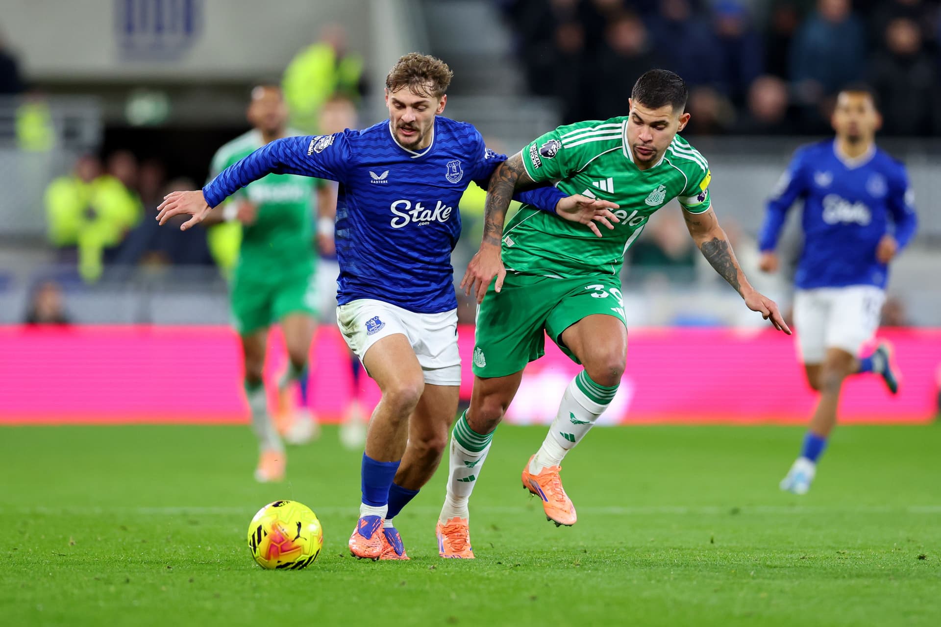 Kiernan Dewsbury-Hall of Everton is challenged by Bruno Guimaraes of Newcastle United