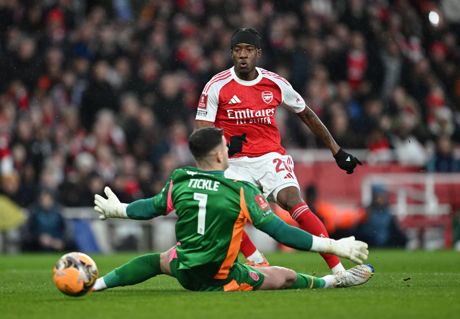 Noni Madueke scores Arsenal's 1st goal during the Emirates FA Cup